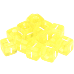 0,5 kg – 580 umělohmotných duhových kostek s písmenkem I – žluté