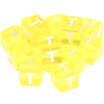 0,5 kg – 580 umělohmotných duhových kostek s písmenkem T – žluté