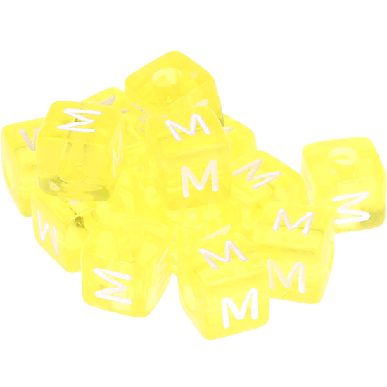 0,5 kg – 580 umělohmotných duhových kostek s písmenkem M – žluté