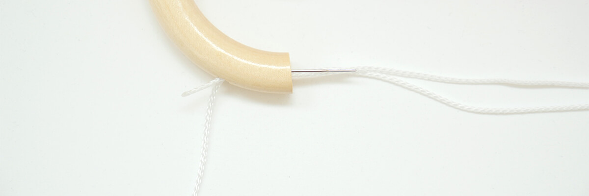 step-by-step instructions baby mobile: stringing half ring