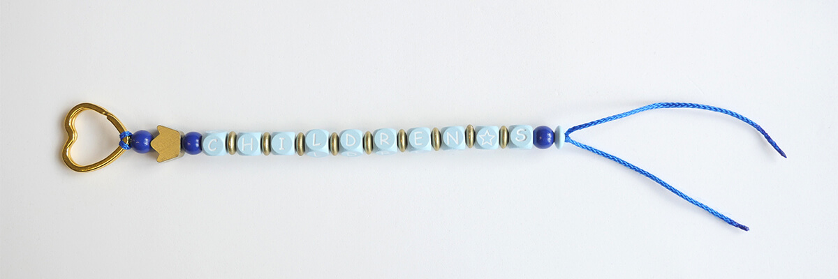 Bastelanleitung Schlüsselanhänger: Perlen aufgefädelt