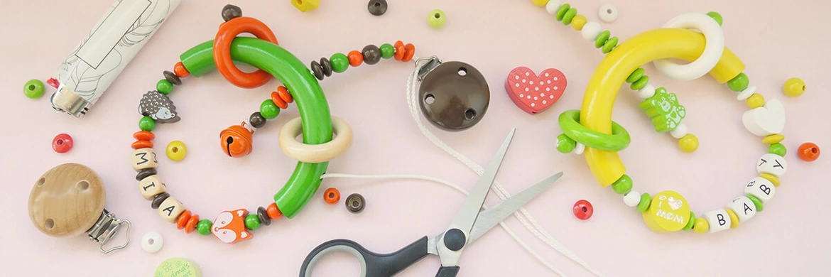 Bastelanleitung Kinderwagenkette – Fertiges Kinderwagenmobile